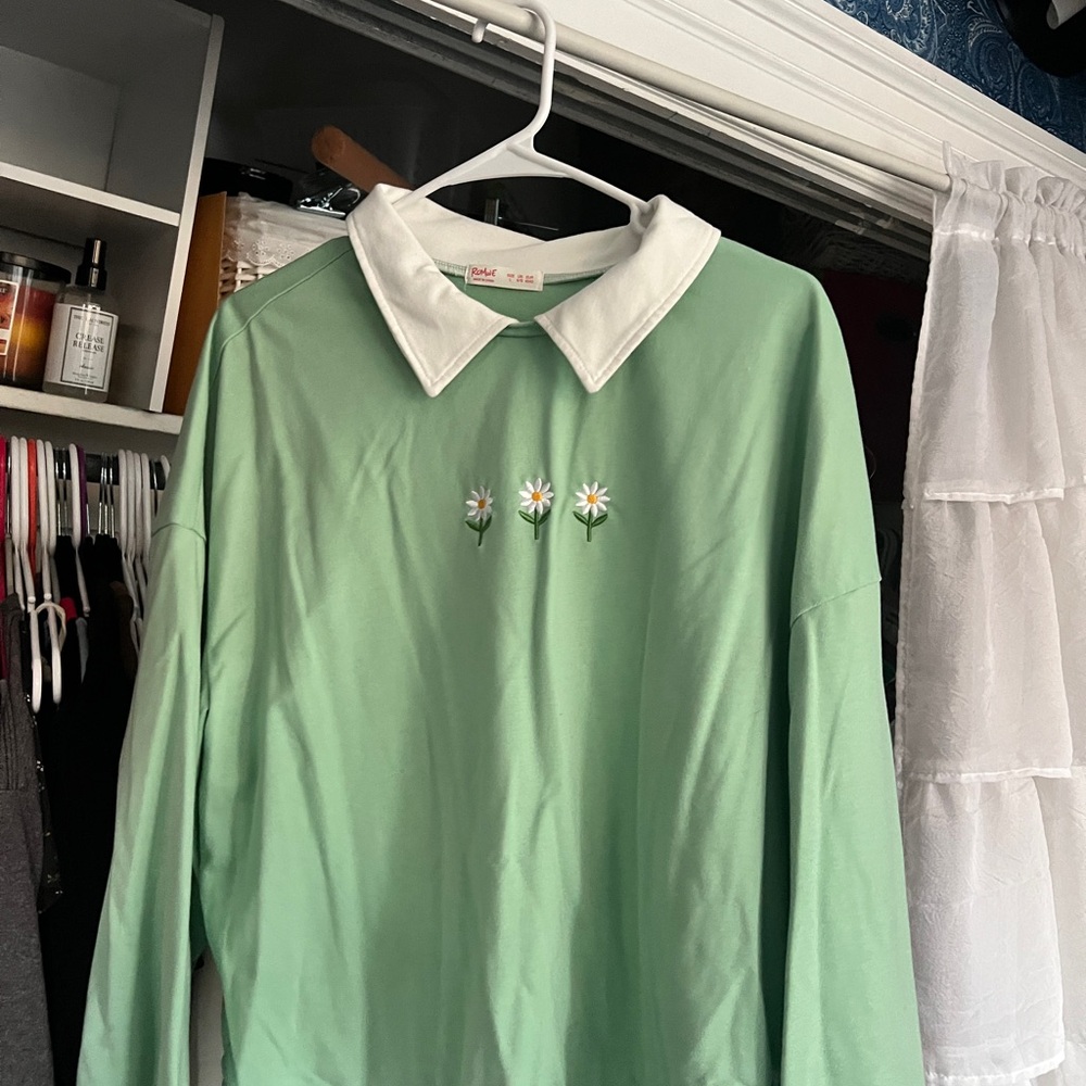 Light green long sleeved collared polo